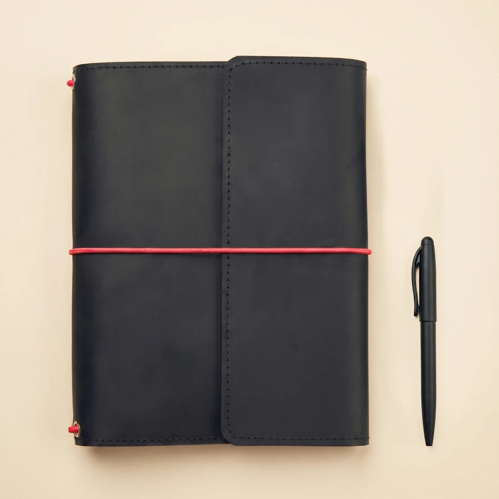Handcrafted leather notebook case with elastic straps and practical pen holder loop