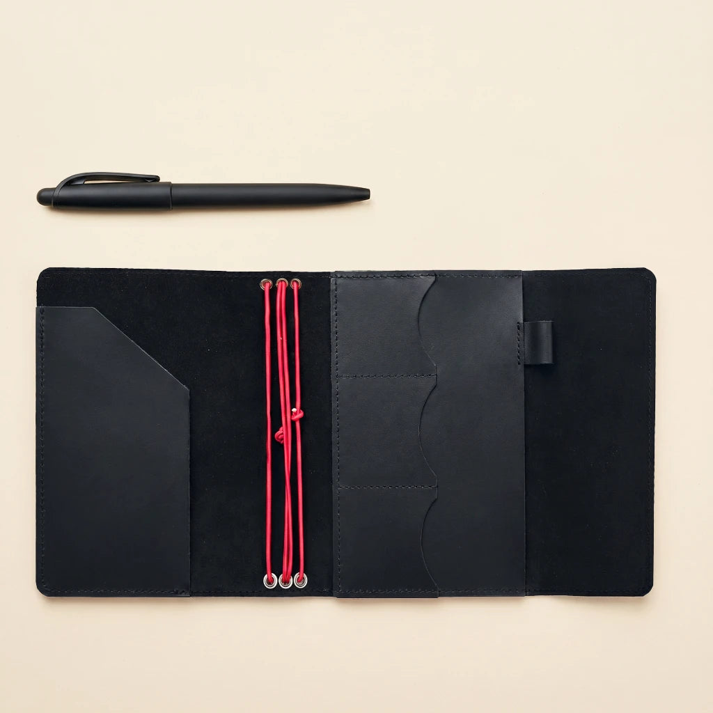 Genuine leather notebook wrap with elastic straps and refillable journal function