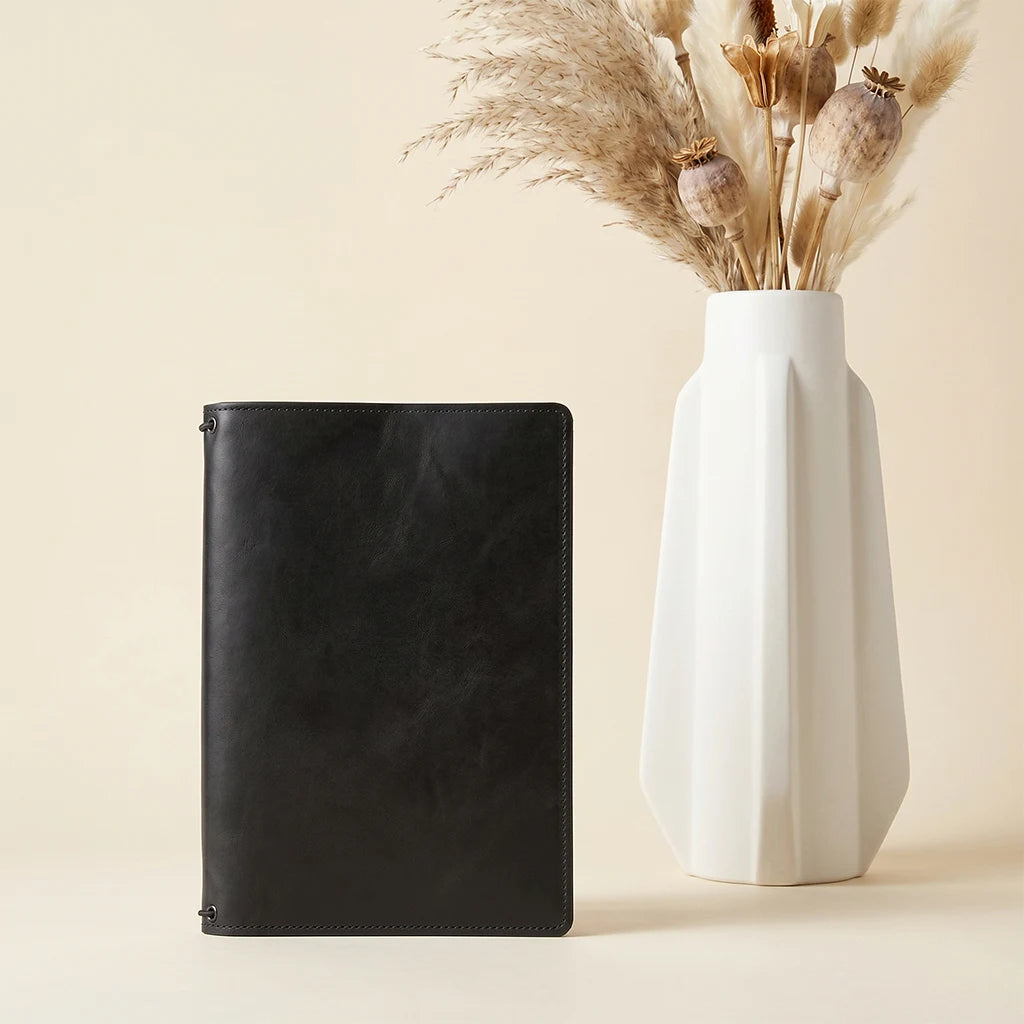 Genuine leather notebook organizer with elegant appearance and useful compartments.