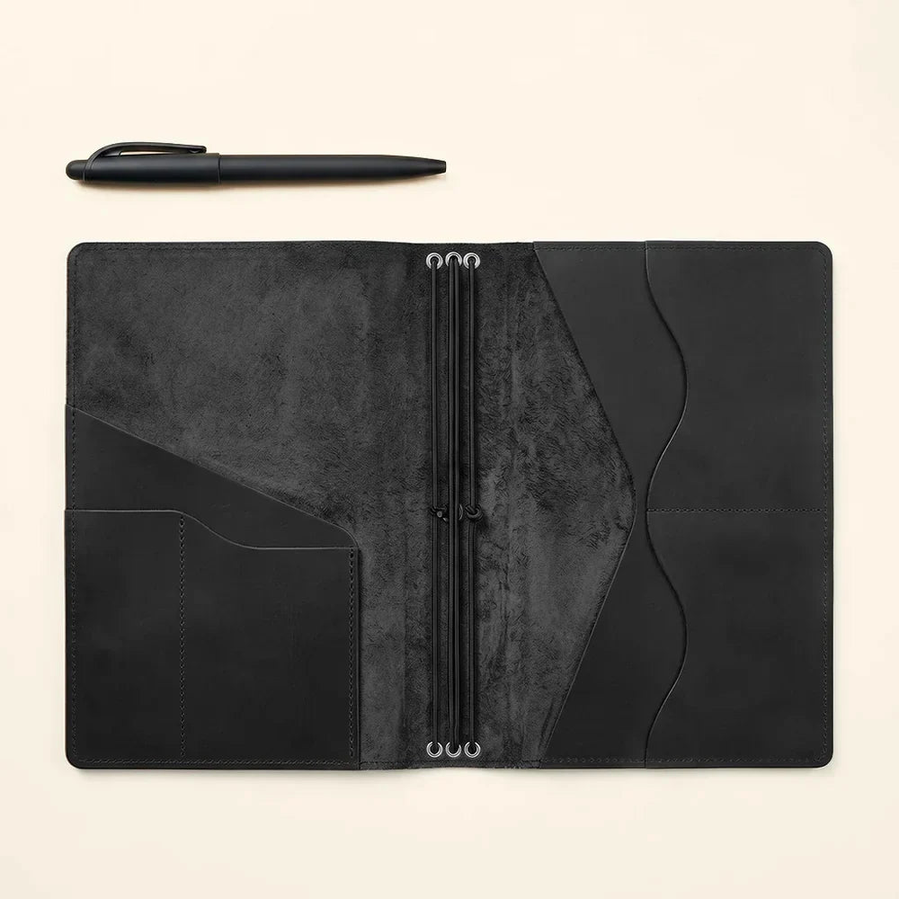 Premium genuine leather notebook cover with storage pockets and three refillable elastic bands.