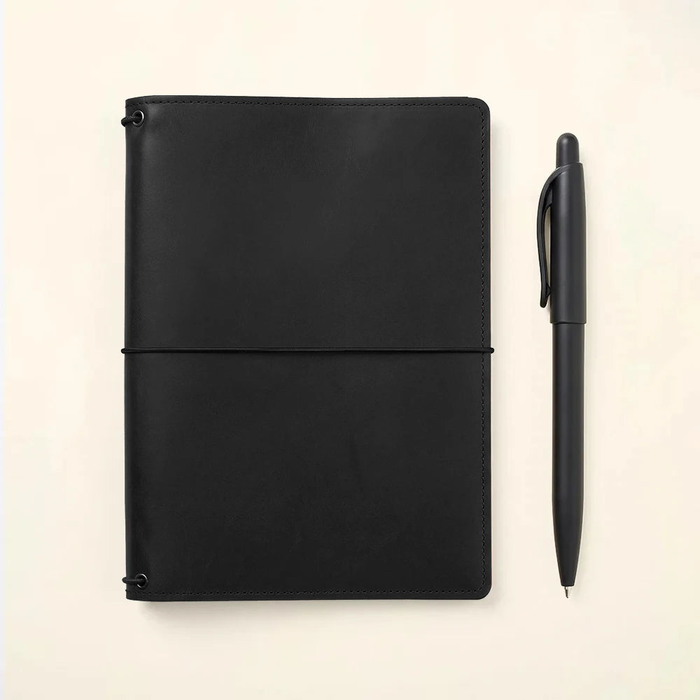 Genuine leather notebook cover with three elastic bands and practical interior organization pockets.