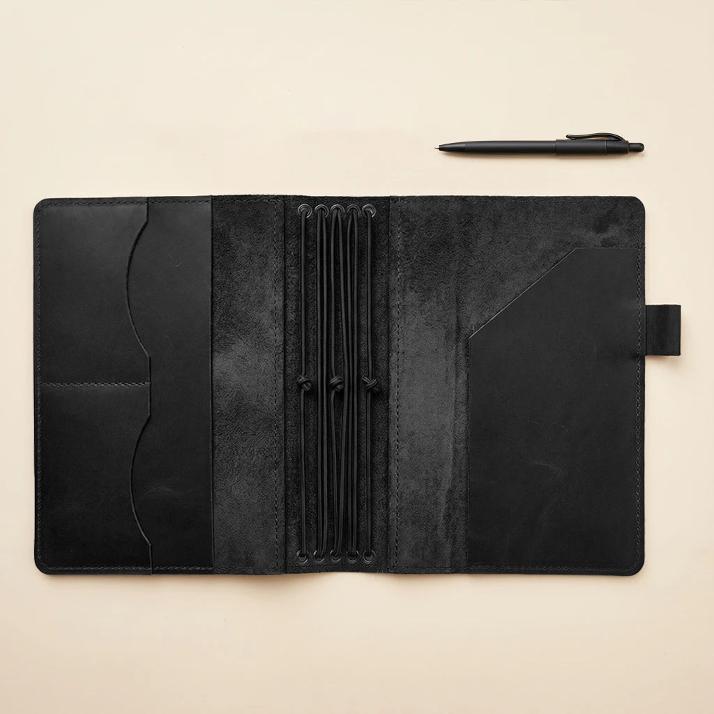 Leather refillable journal cover with storage pockets and elastic support system