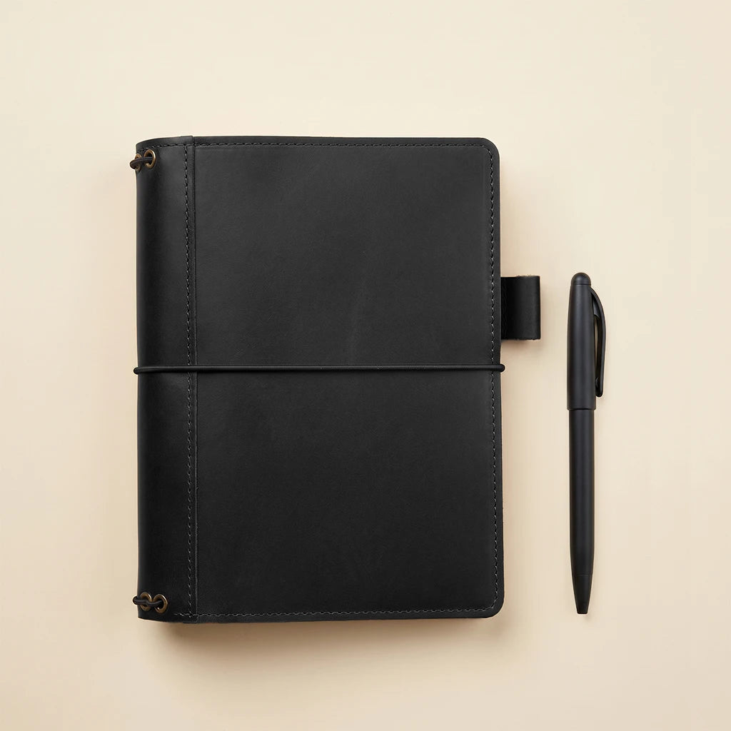 Leather notebook organizer crafted for journal inserts and daily writing essentials
