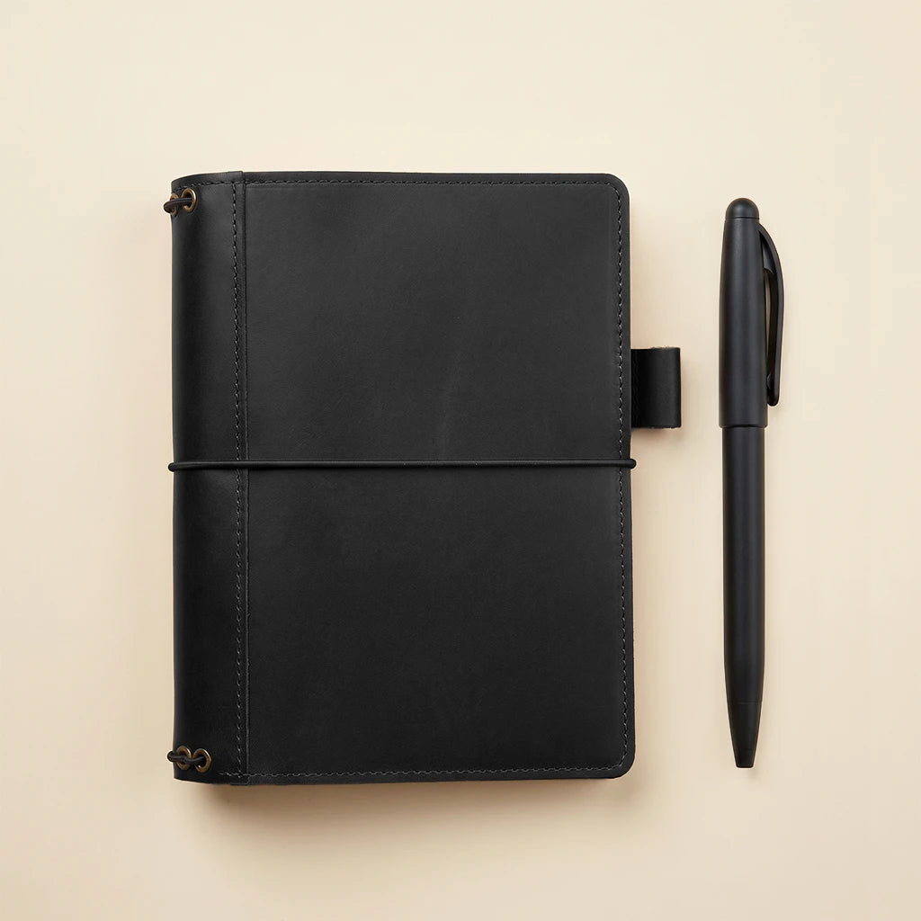 Refillable leather journal cover designed with five elastic notebook straps