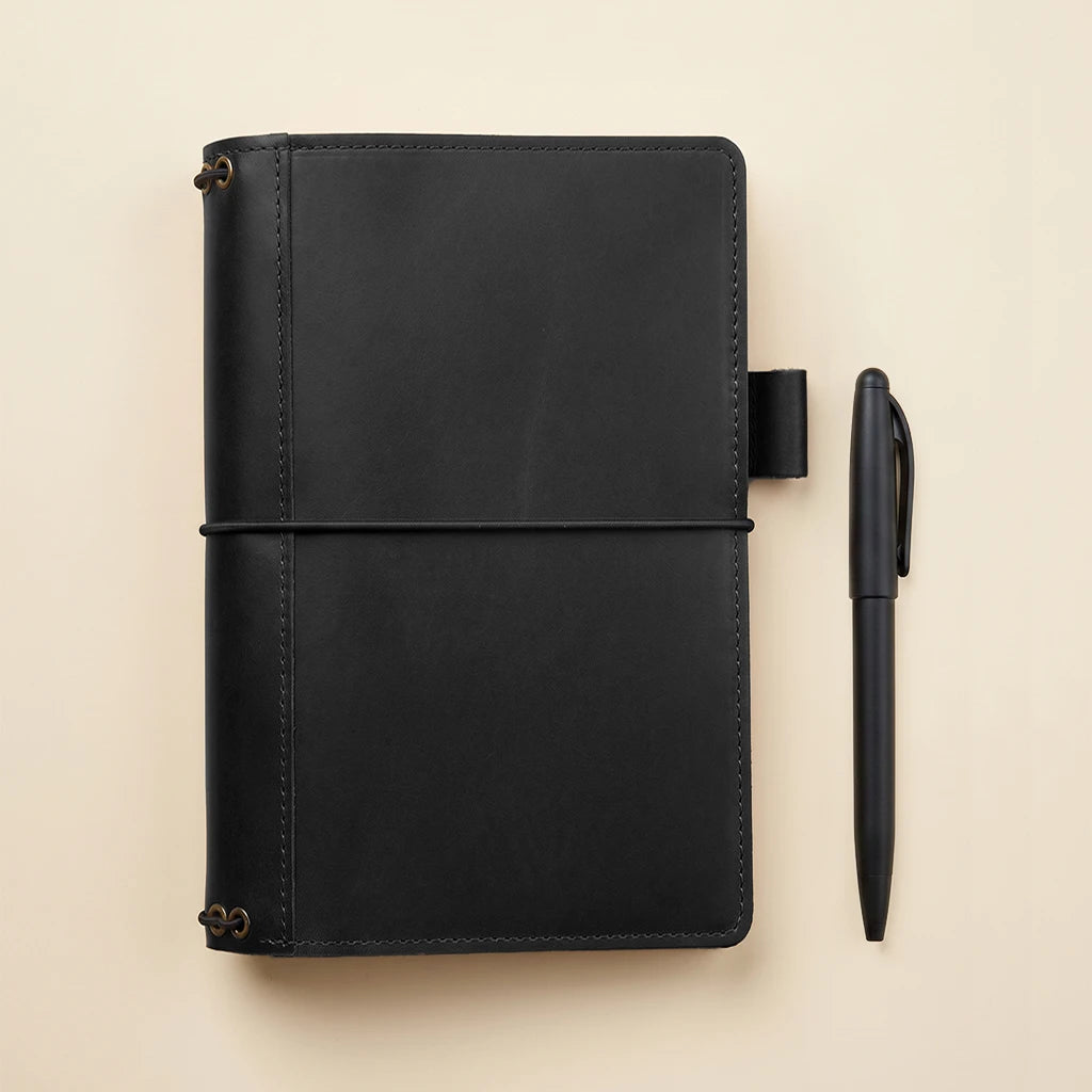 Leather writing notebook case with secure elastics and interior storage