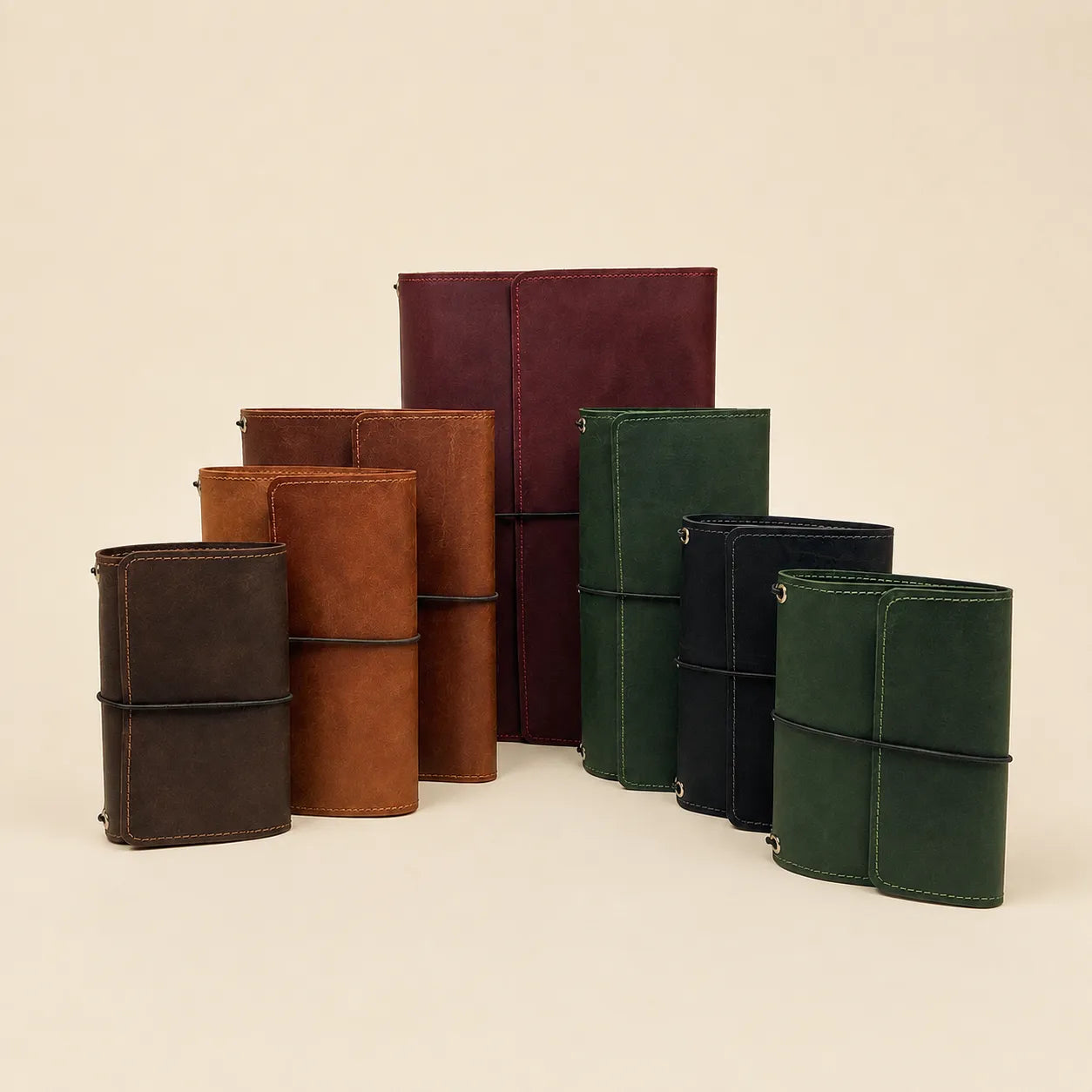 Leather notebook cover featuring organized compartments and elastic closures.