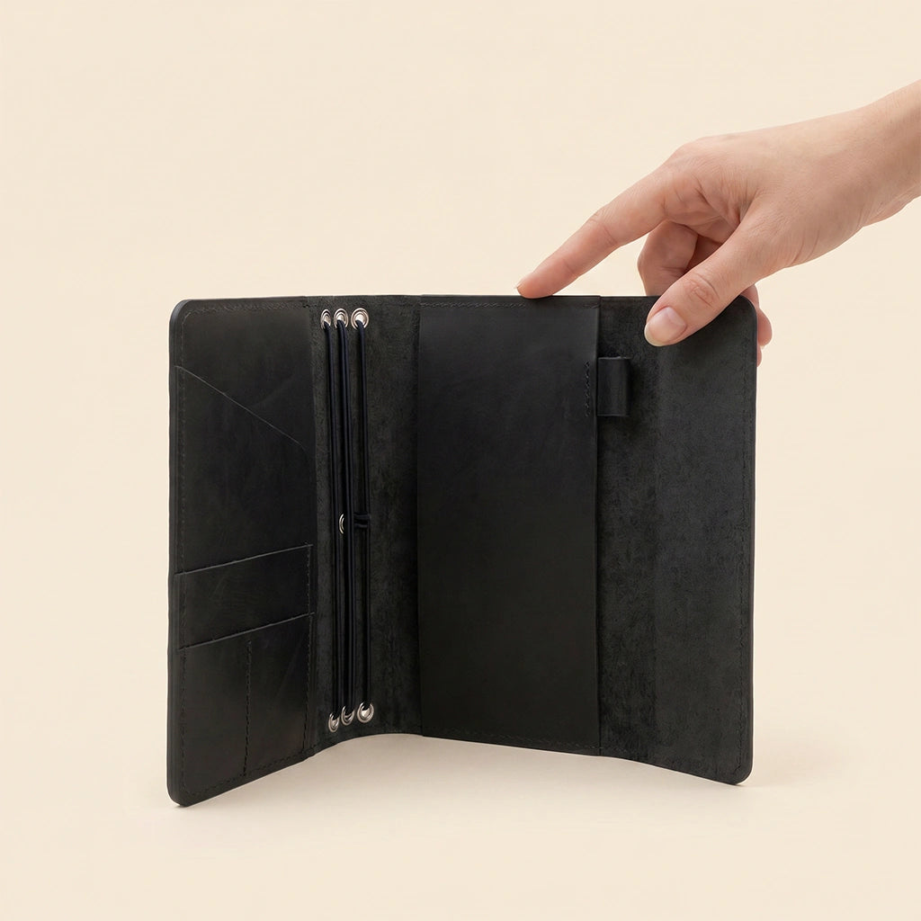 Leather refillable journal cover with organized interior and premium natural leather construction.