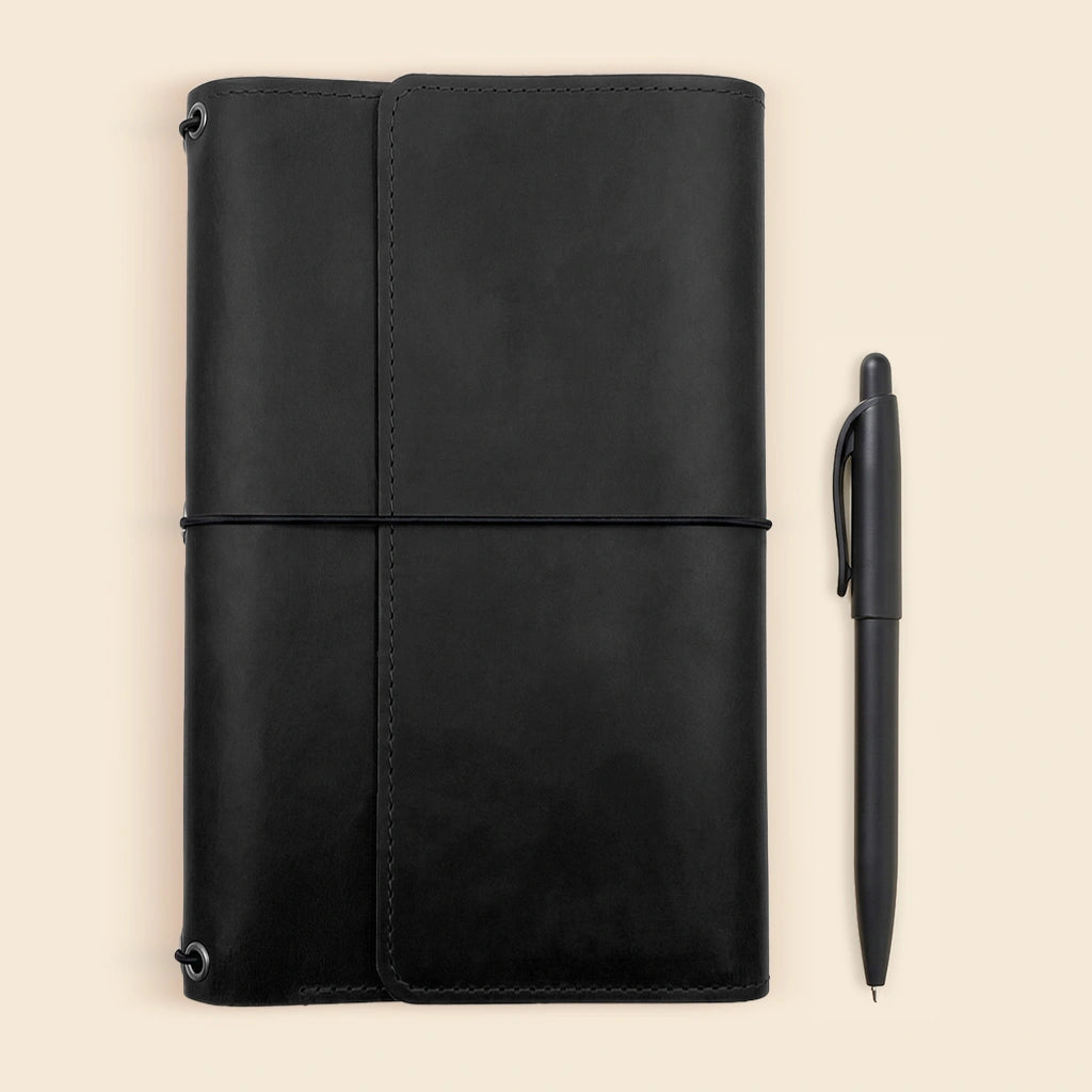Leather notebook organizer combining classic craftsmanship with modern functional features.