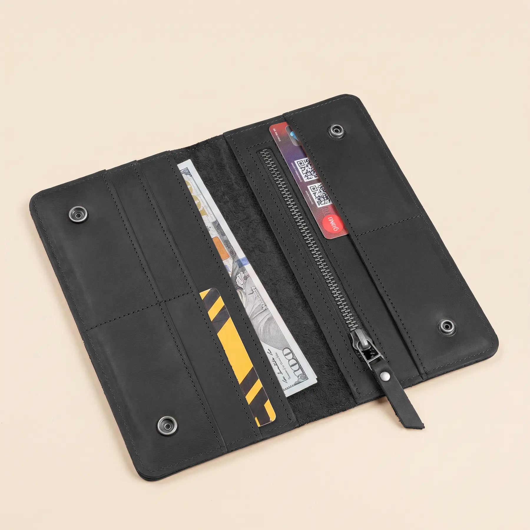 Stylish full grain leather wallet with zipper pocket, multiple card slots, and bill compartments.