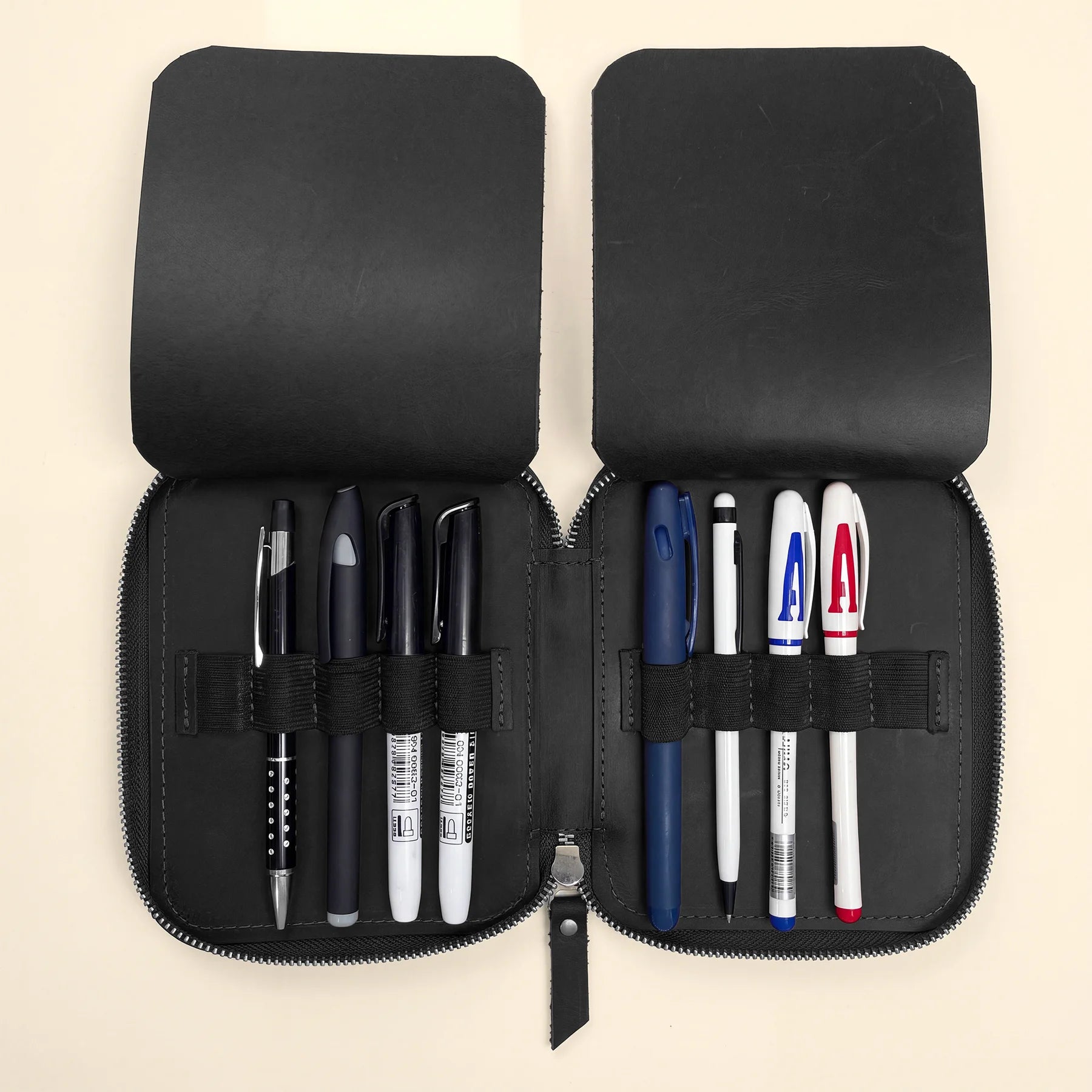 Leather pen storage case with zipper crafted from high-quality natural leather.