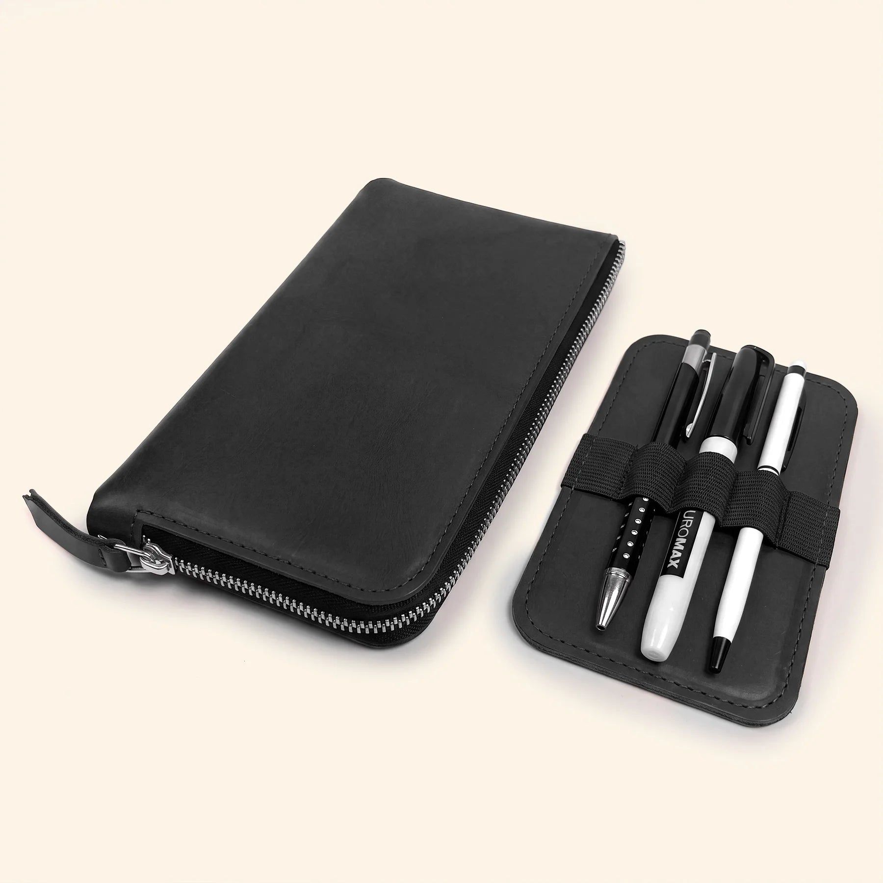 Handcrafted genuine leather zipper pen case with spacious interior for everyday stationery organization.