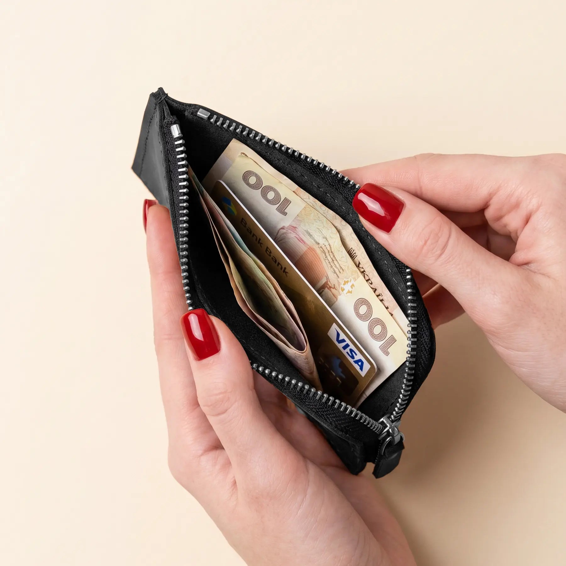 Full grain leather zip wallet offering practical storage in a sleek handcrafted compact silhouette.