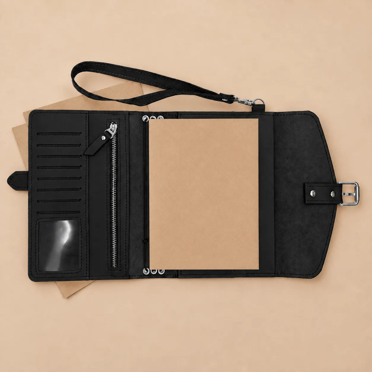 Handmade genuine leather journal cover with storage pockets and wrist carrying strap