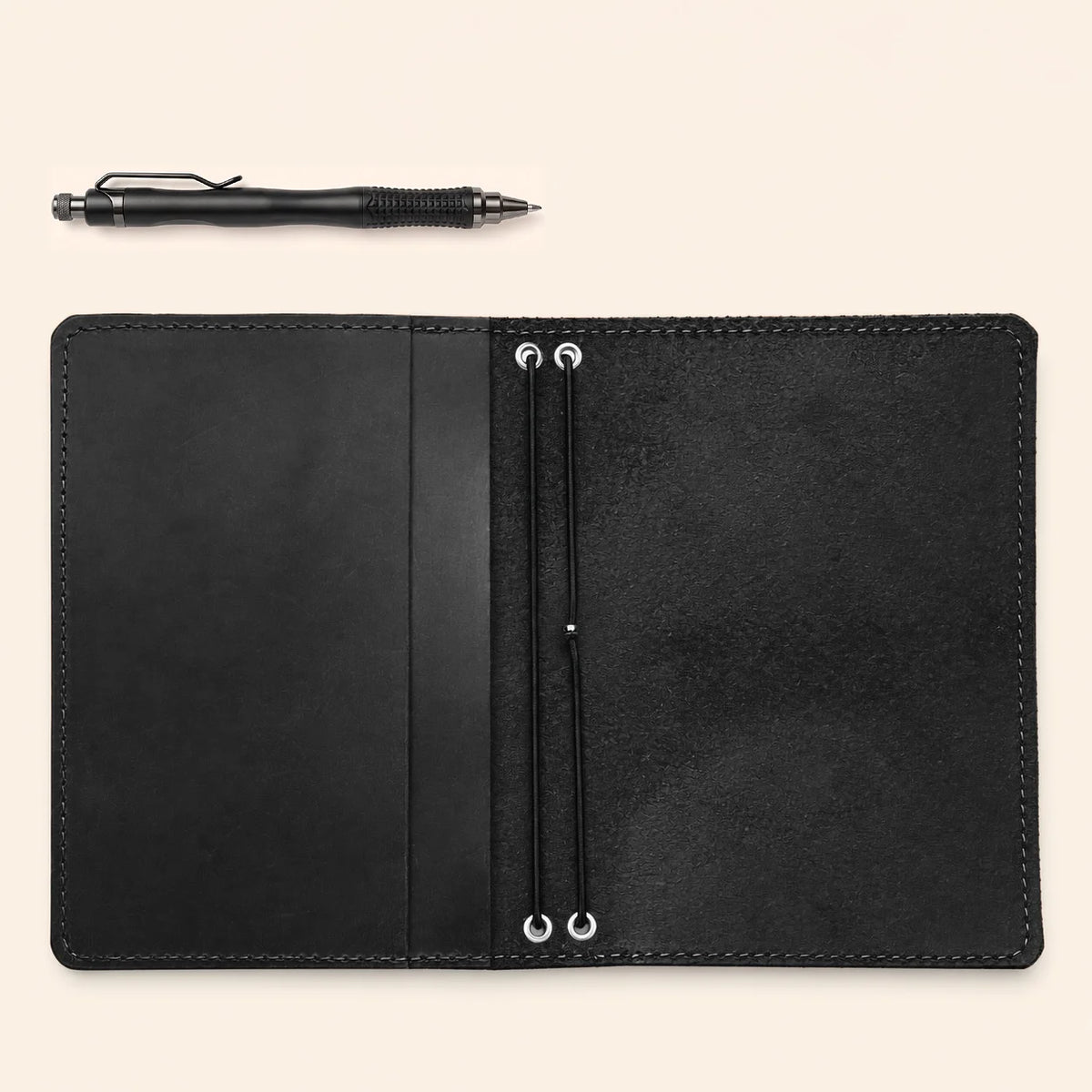 Handcrafted Crazy Horse journal sleeve with paired elastic closures and spacious inner pockets