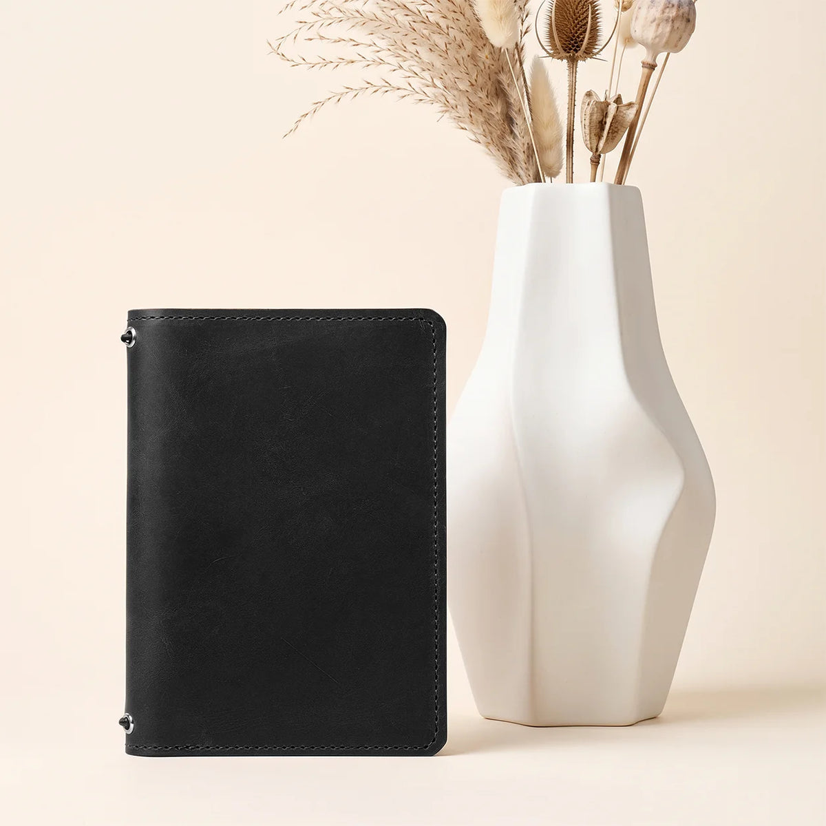 Genuine first grade leather notebook organizer with two retaining bands and inner storage