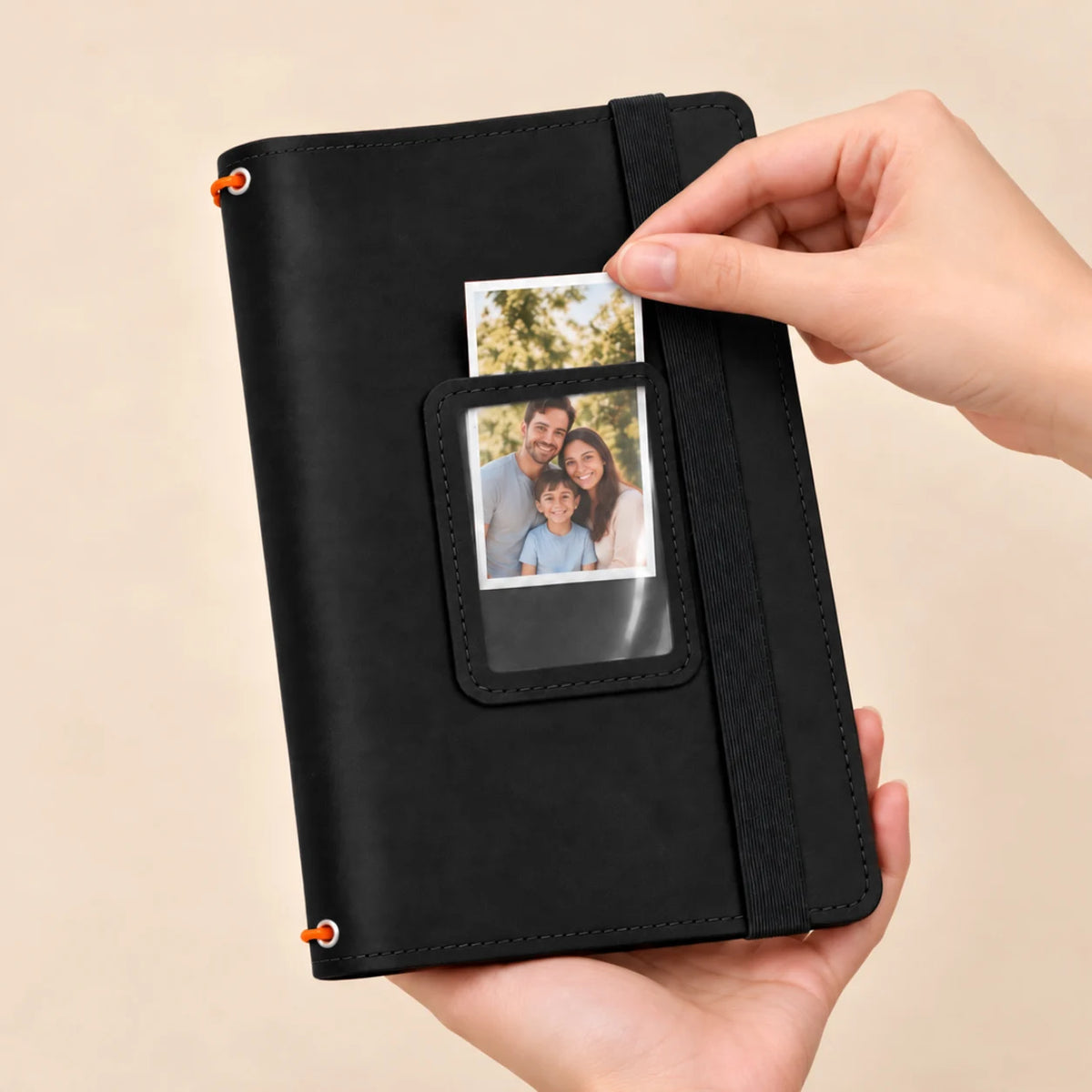 Natural leather notebook featuring three flexible holders, inner storage pockets, and a clear picture display window.