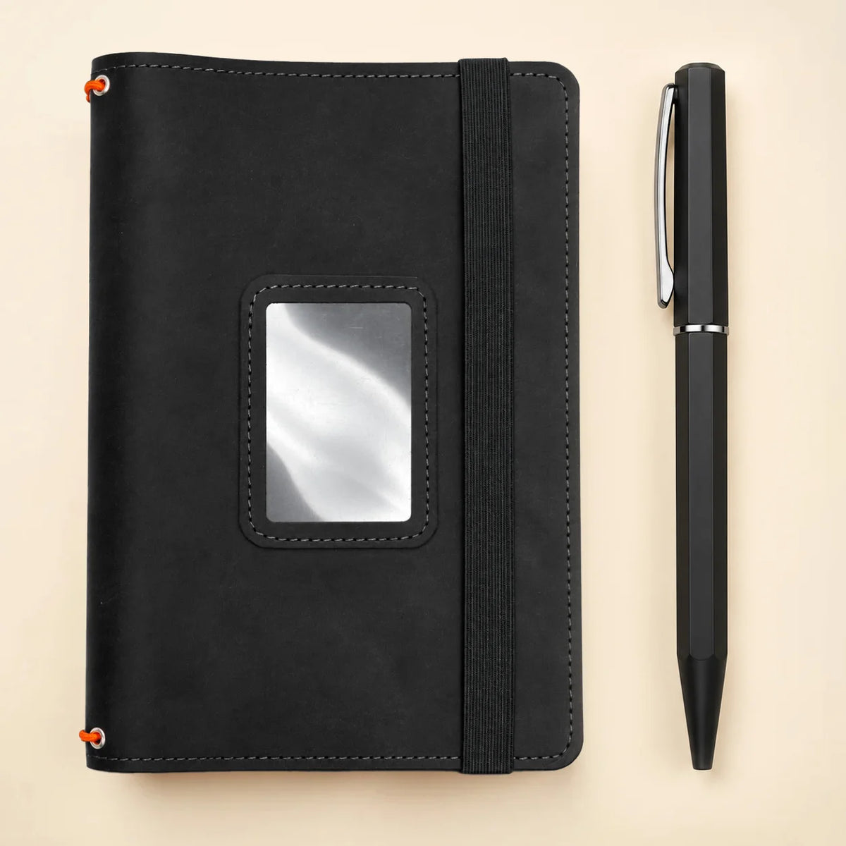 Natural leather notebook cover featuring three flexible bands and convenient interior pockets.
