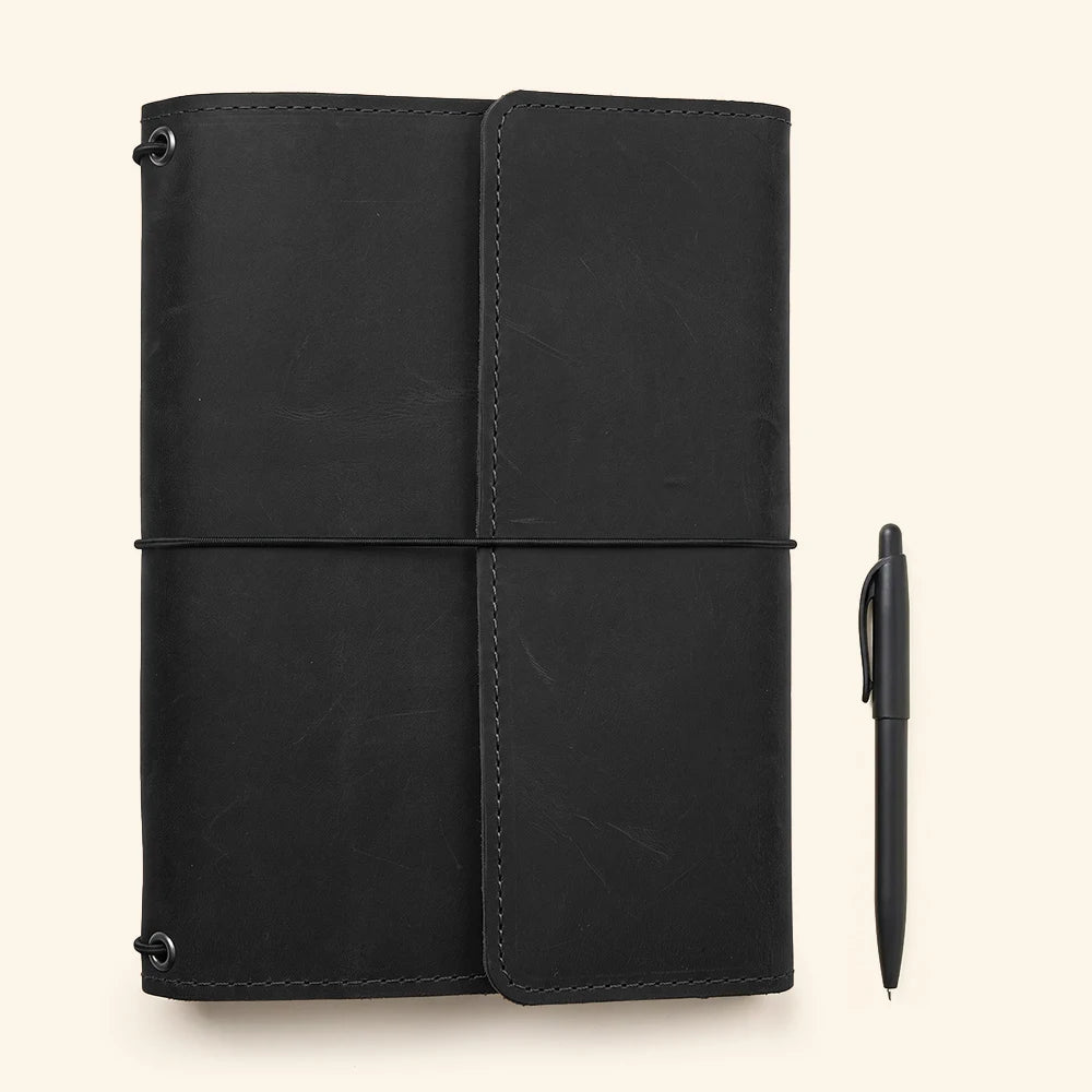 Premium leather journal organizer with refined craftsmanship and practical notebook storage solution.