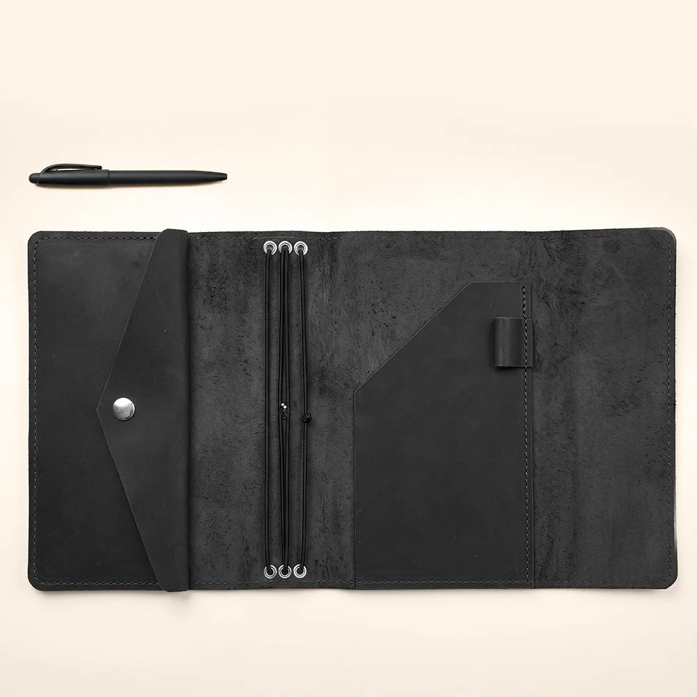 Premium leather cover designed to organize refillable notebooks with elegant handcrafted style.