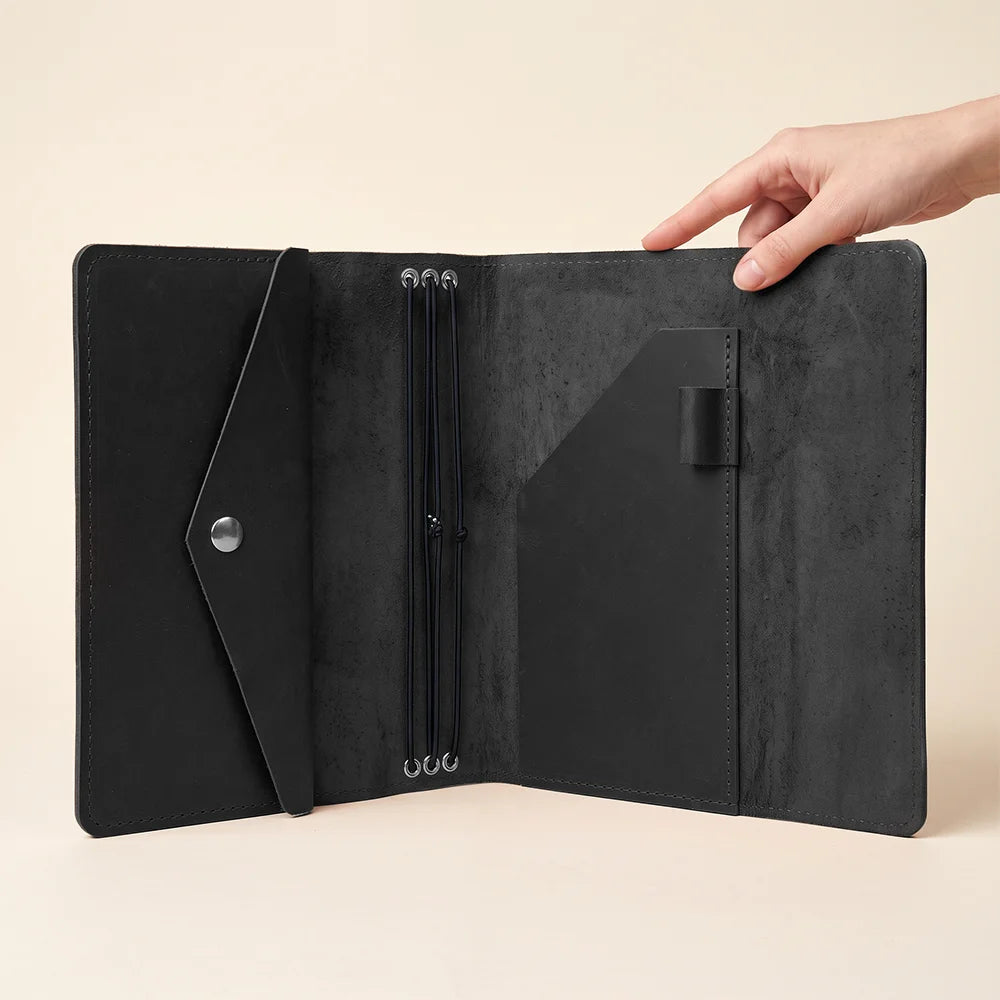 Beautiful leather journal cover combining durable construction with practical interior organization features.