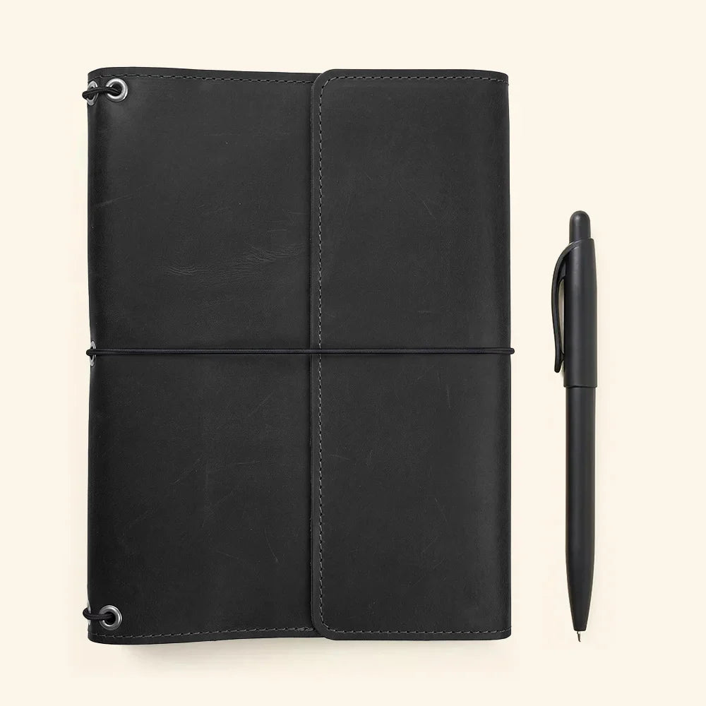Leather organizer for refillable notebooks featuring practical storage and timeless handcrafted craftsmanship.