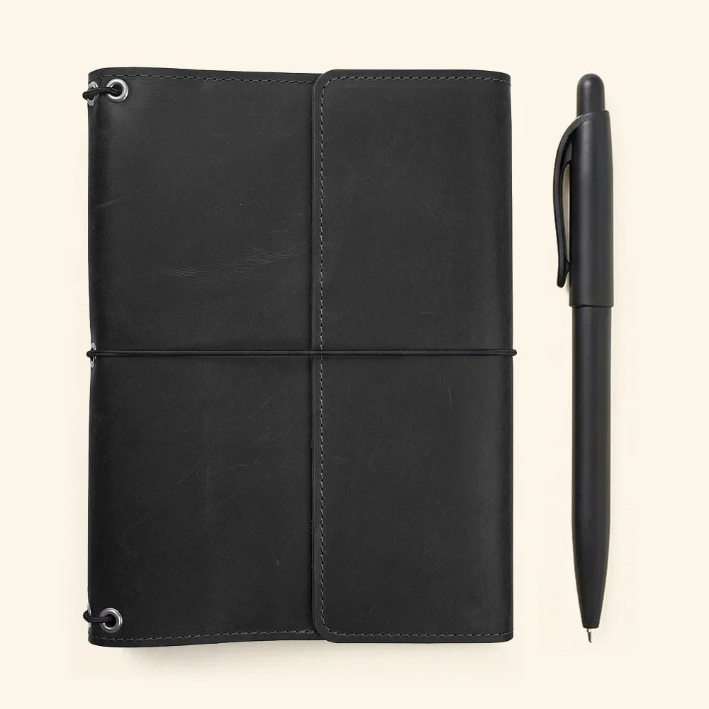 Refillable genuine leather notebook cover built for daily use with organized inside compartments.