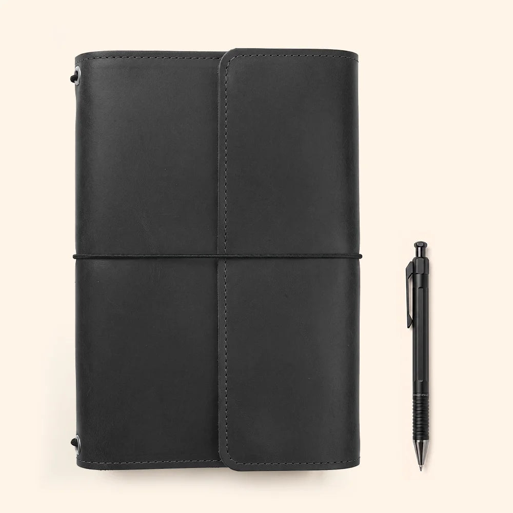 Handmade genuine leather notebook case displaying useful compartments and secure writing instrument placement.