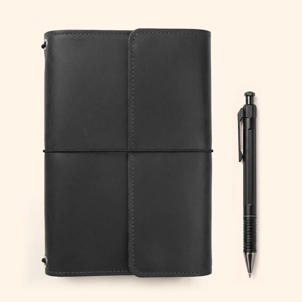 Natural hide planner organizer with thoughtfully arranged storage sections and dedicated pen accommodation.