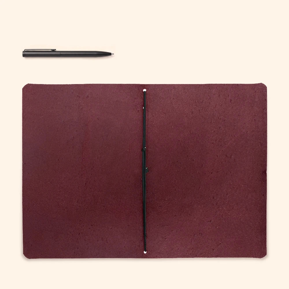 Natural leather writing case paired with a simple journal for everyday creativity.