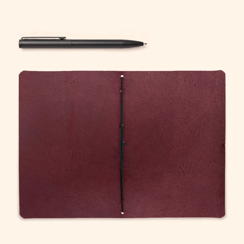 Genuine leather notebook wrap combining flexible construction with a clean writing companion.