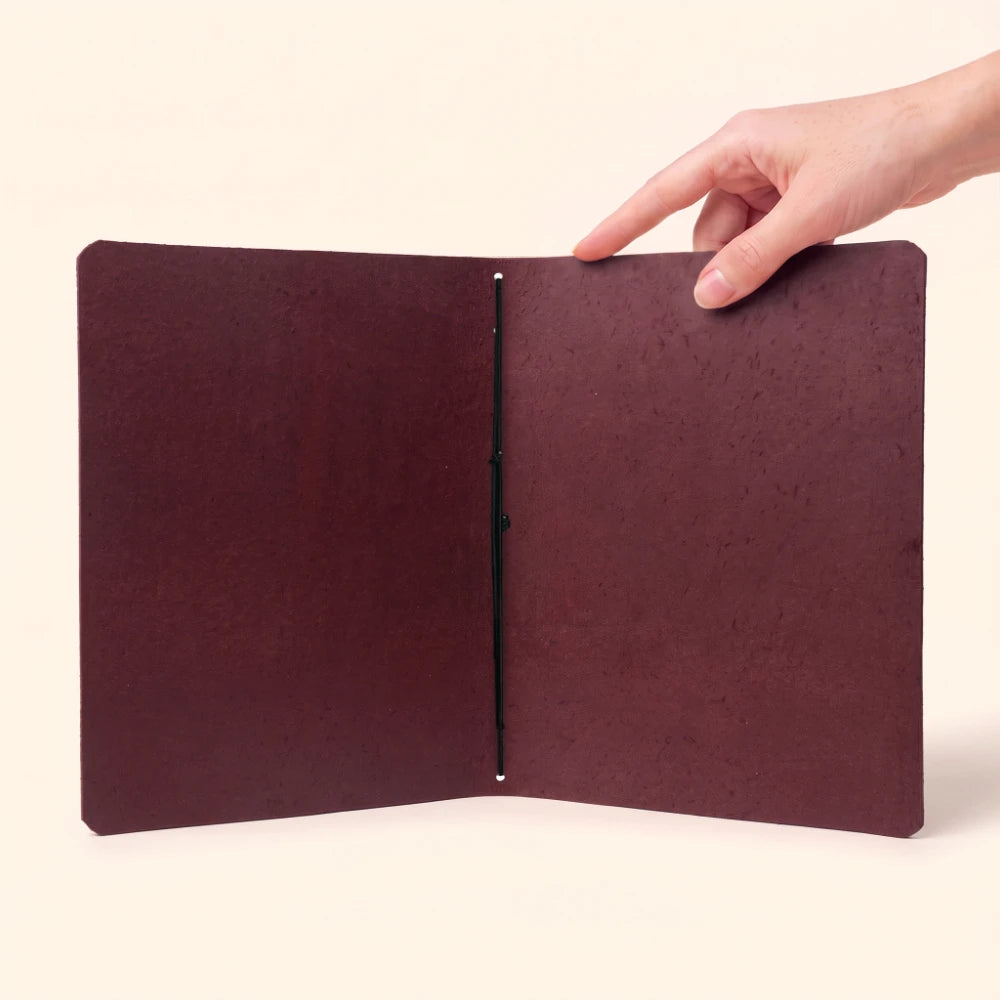 Practical leather journal sleeve designed for writers who prefer simple organization.