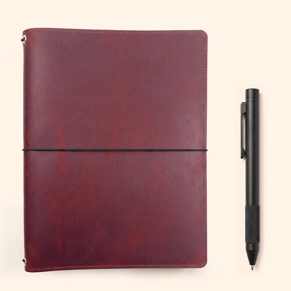 Handcrafted notebook cover with interior storage designed for creative and everyday writing.