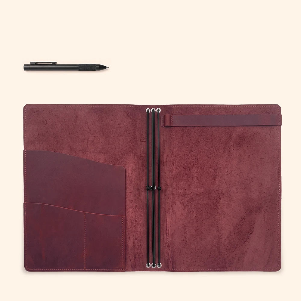 Open journal organizer made from genuine leather with practical storage and insert holders.