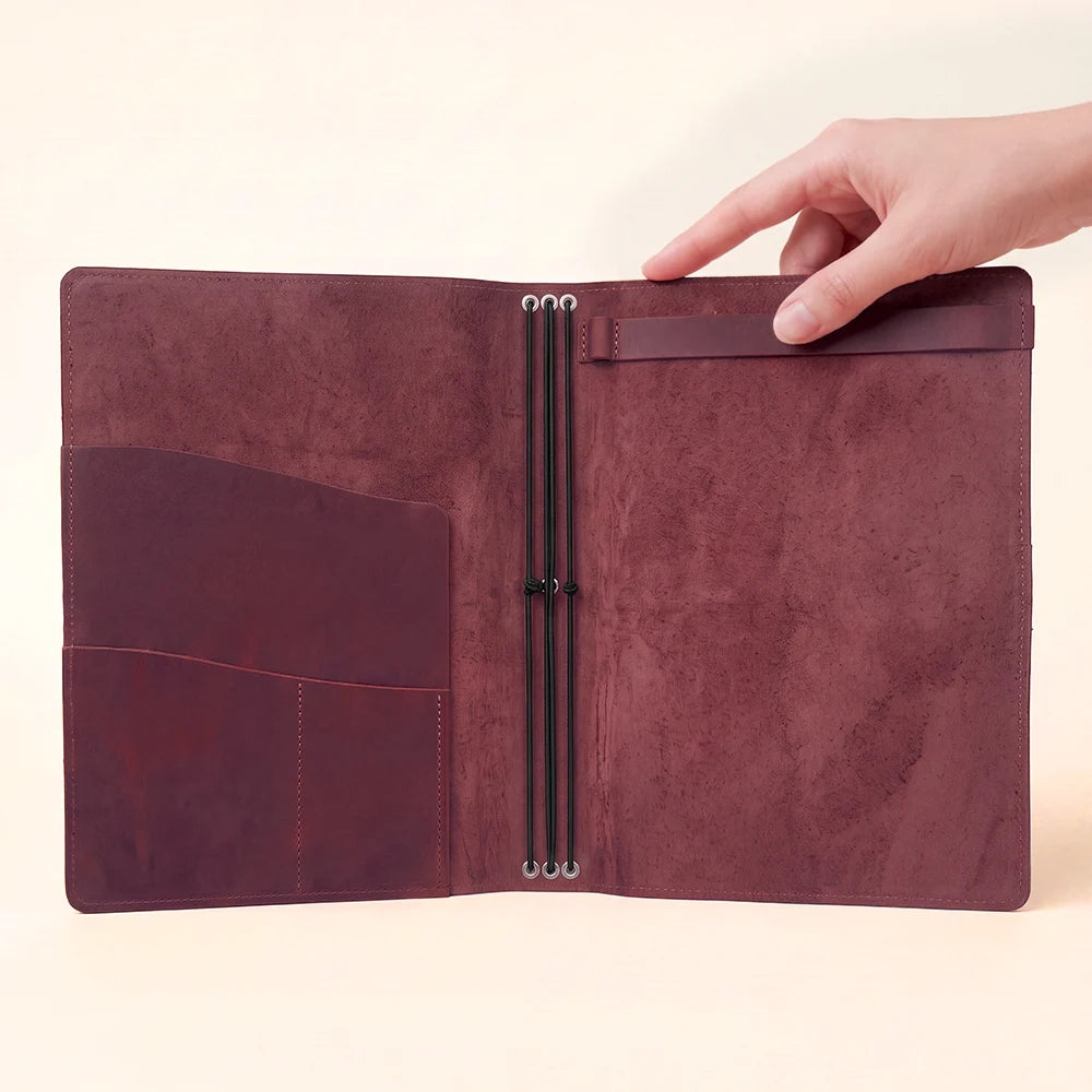 Open sketchbook cover crafted from genuine leather with pockets and elastic retainers