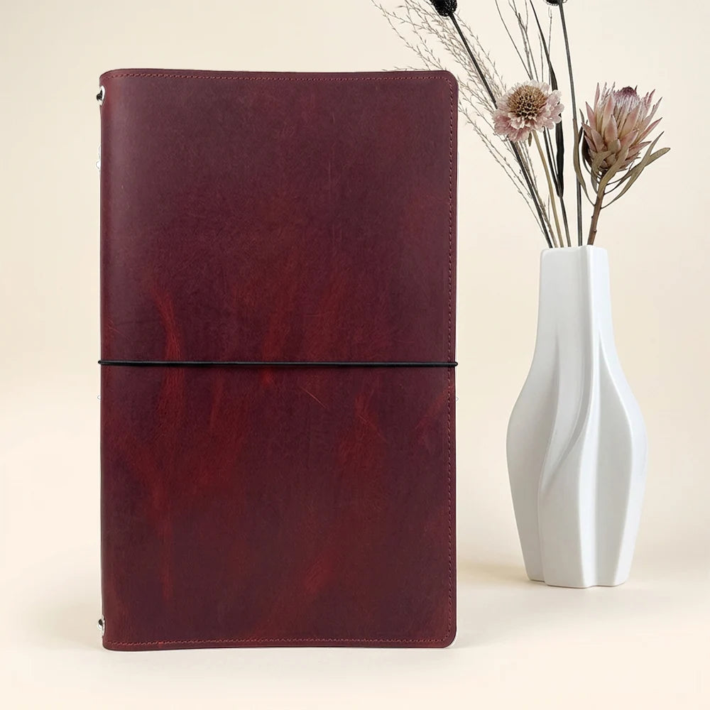 Handmade journal cover designed to organize notebooks, sketches, cards, and small papers.