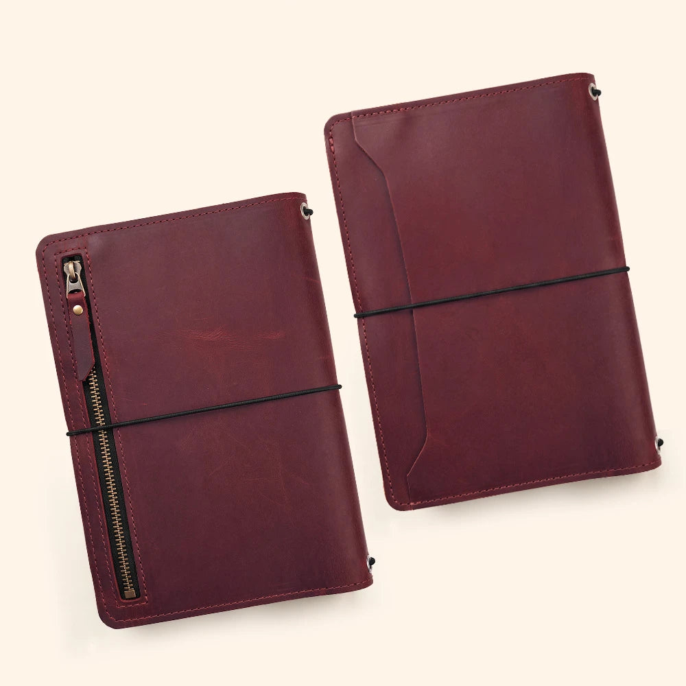 Handmade leather notebook wallet with organized sleeves and dedicated space for your pen.