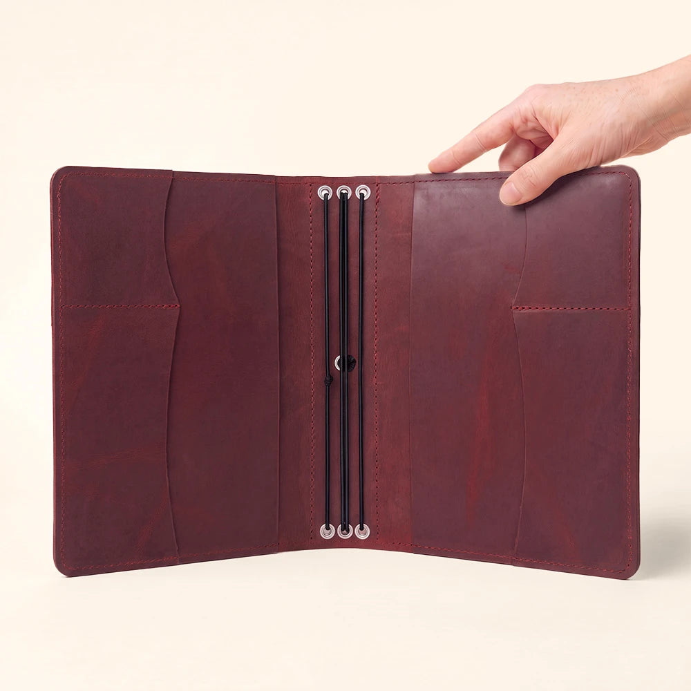 Leather notebook protector with premium interior organization for business and personal notes.