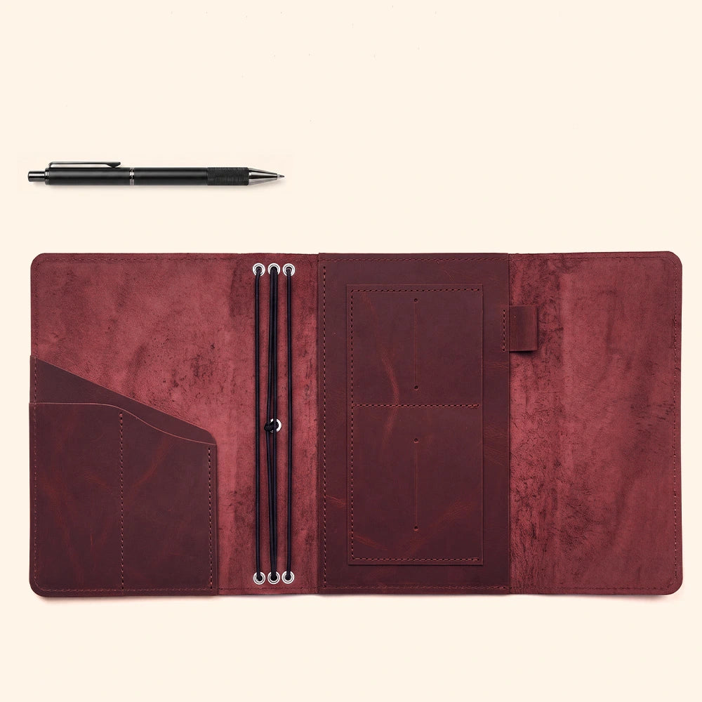 Handcrafted notebook portfolio made from genuine leather with organized inside compartments.