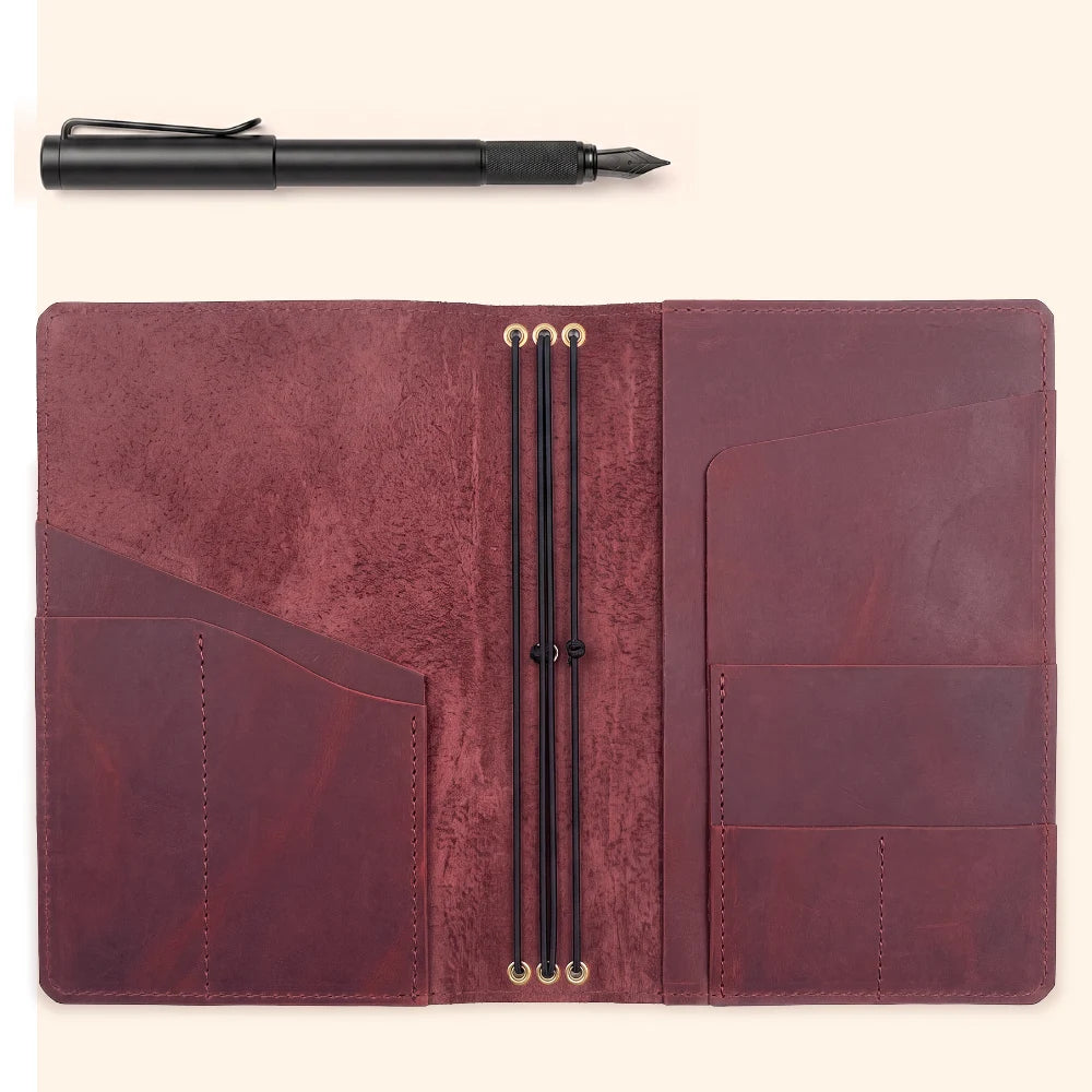 Refillable leather travel journal cover with three interior loops for notebook inserts.