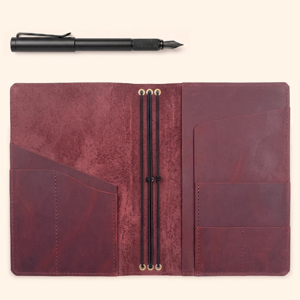Natural leather refillable journal holder designed with three secure elastic straps.