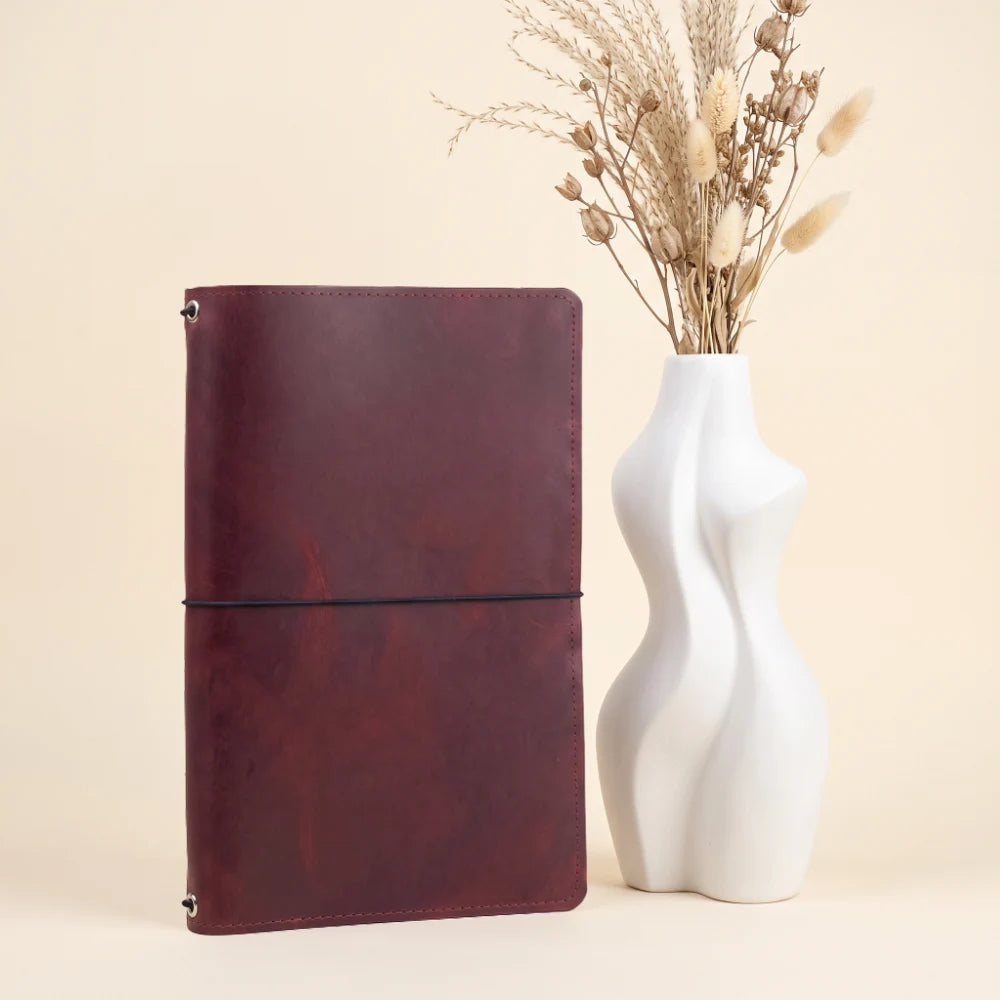 Artisan leather journal holder built to keep three inserts together