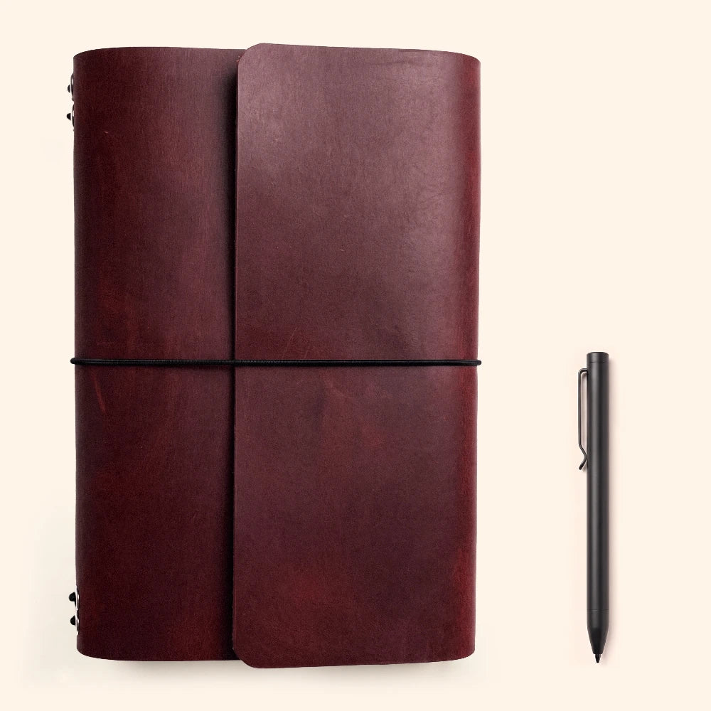 Multipurpose leather writing cover supporting six modular inserts for organized journaling.