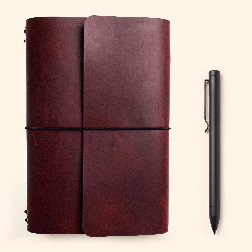 Leather notebook keeper providing six flexible positions for interchangeable paper refills.