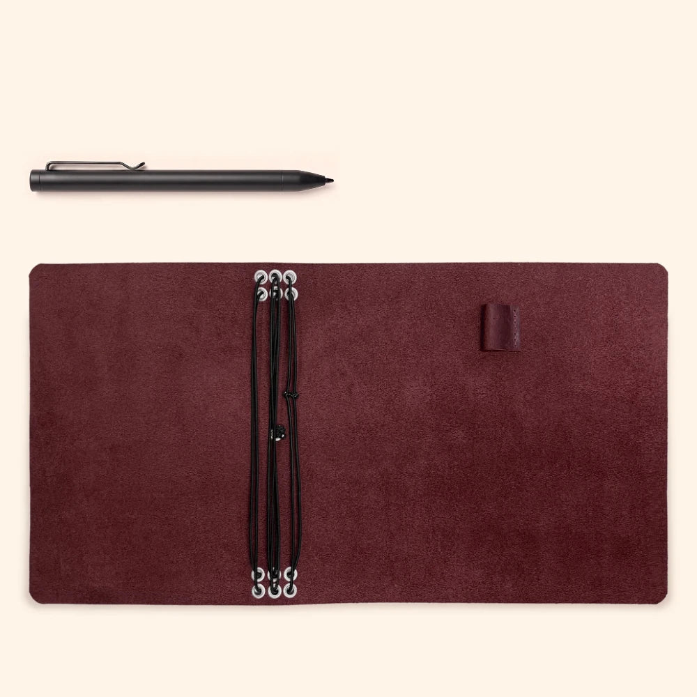 Premium leather refillable journal featuring six interior bands and practical pen storage.