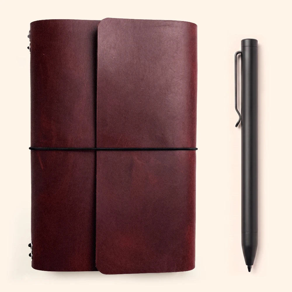 Refillable genuine leather case featuring six elastic holders and an attached pen loop.