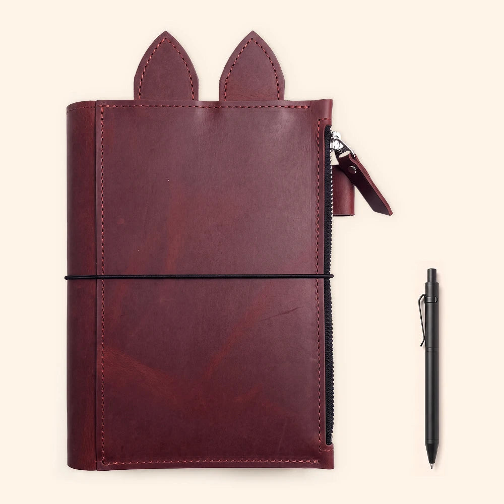 Leather notebook cover featuring practical storage and a distinctive handcrafted appearance.
