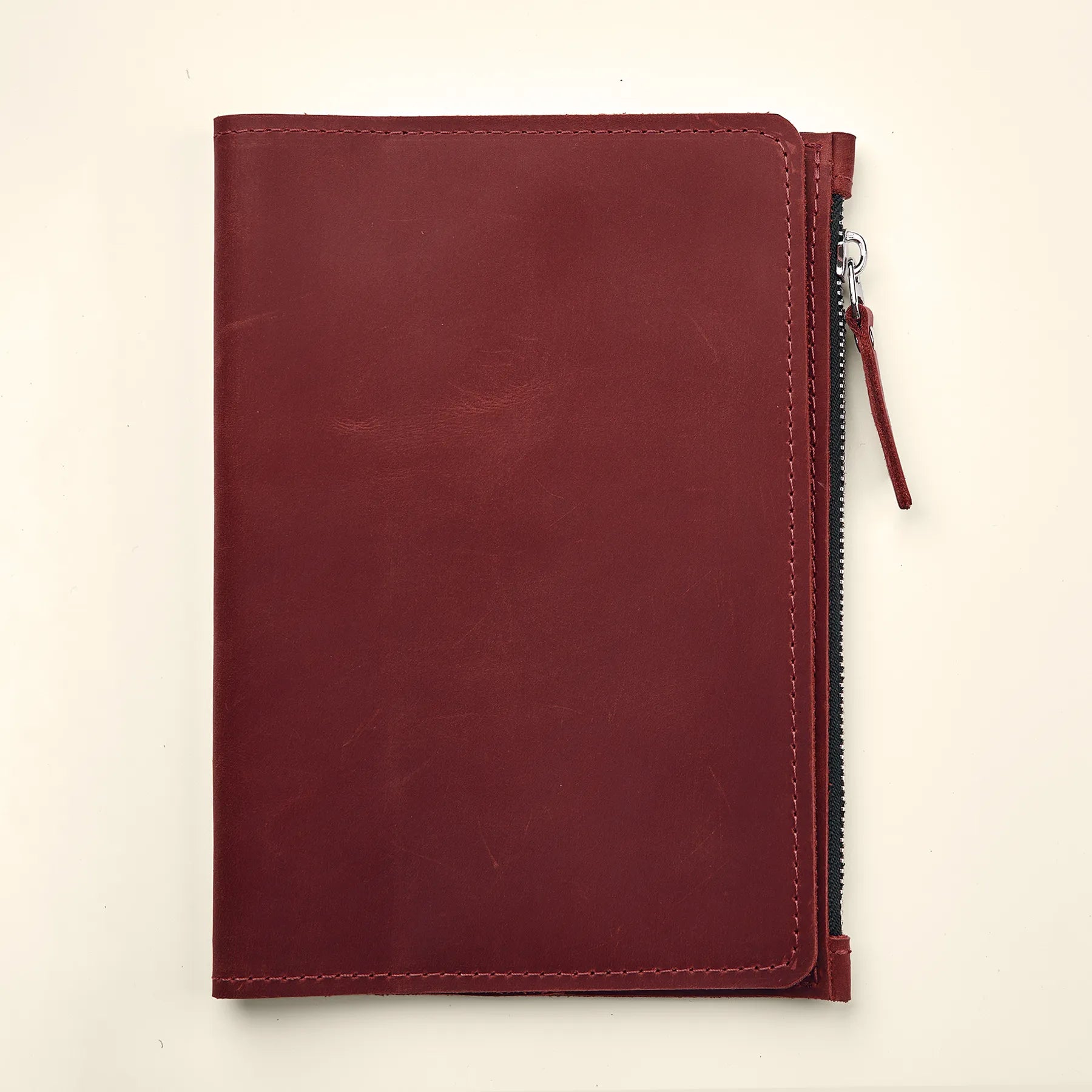 Durable leather notebook insert for organizing cards, notes, and small accessories.
