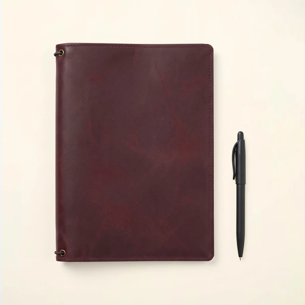 Genuine leather notebook wrap designed for writers and creative professionals.