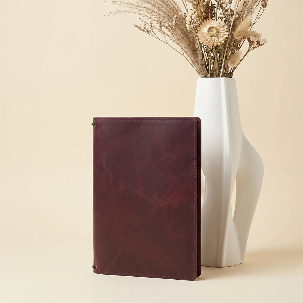 Premium notebook cover featuring organized pockets for cards and documents.