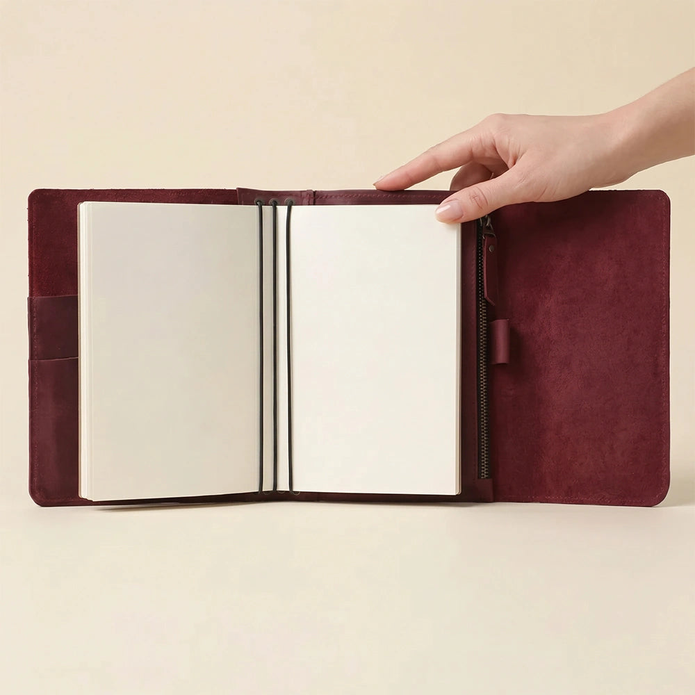 Refillable leather journal cover designed for everyday organization and travel.